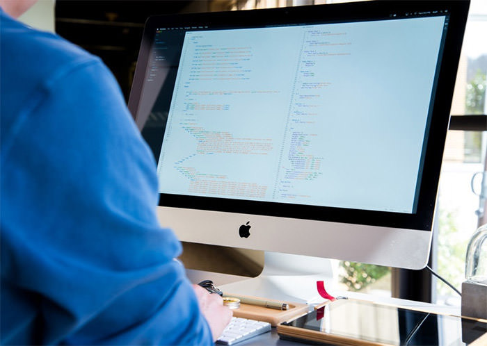 Writing Code on Imac Developer